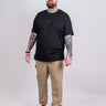 Model is 6'5", 310 lbs, wearing size 2XL